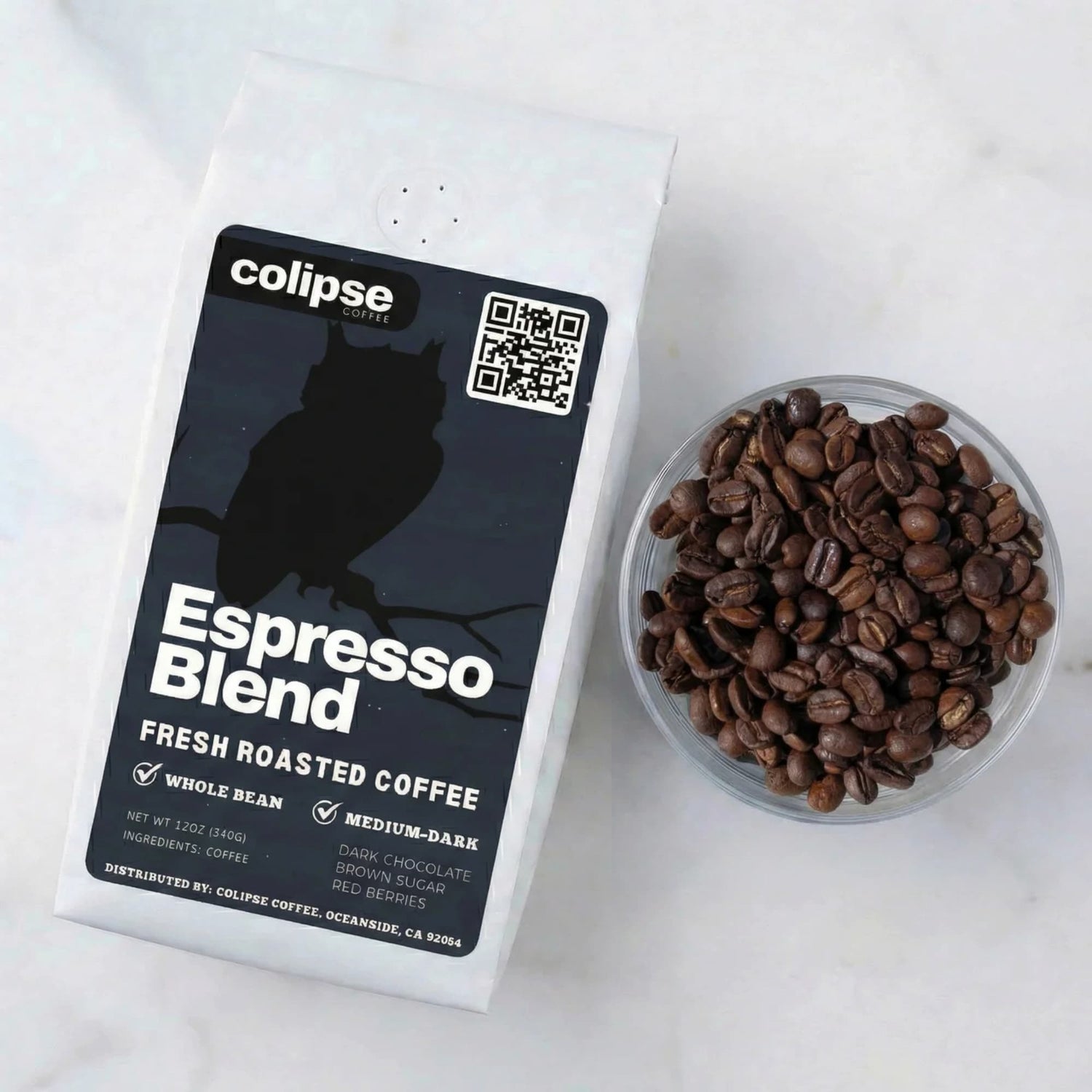 Colipse Coffee Espresso Blend packaging with a bowl of coffee beans on a white background