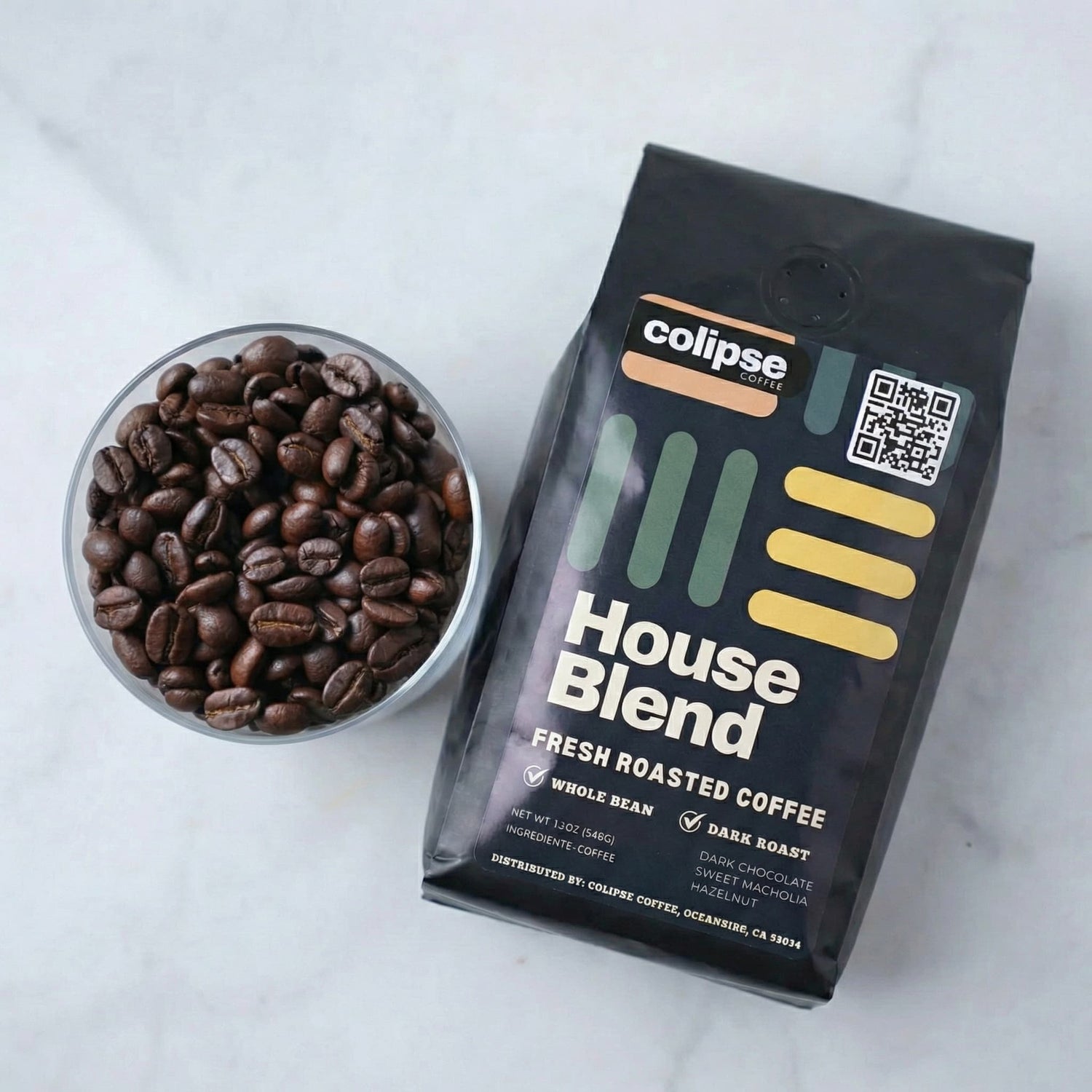 Colipse House Blend coffee package with a bowl of coffee beans on a white background