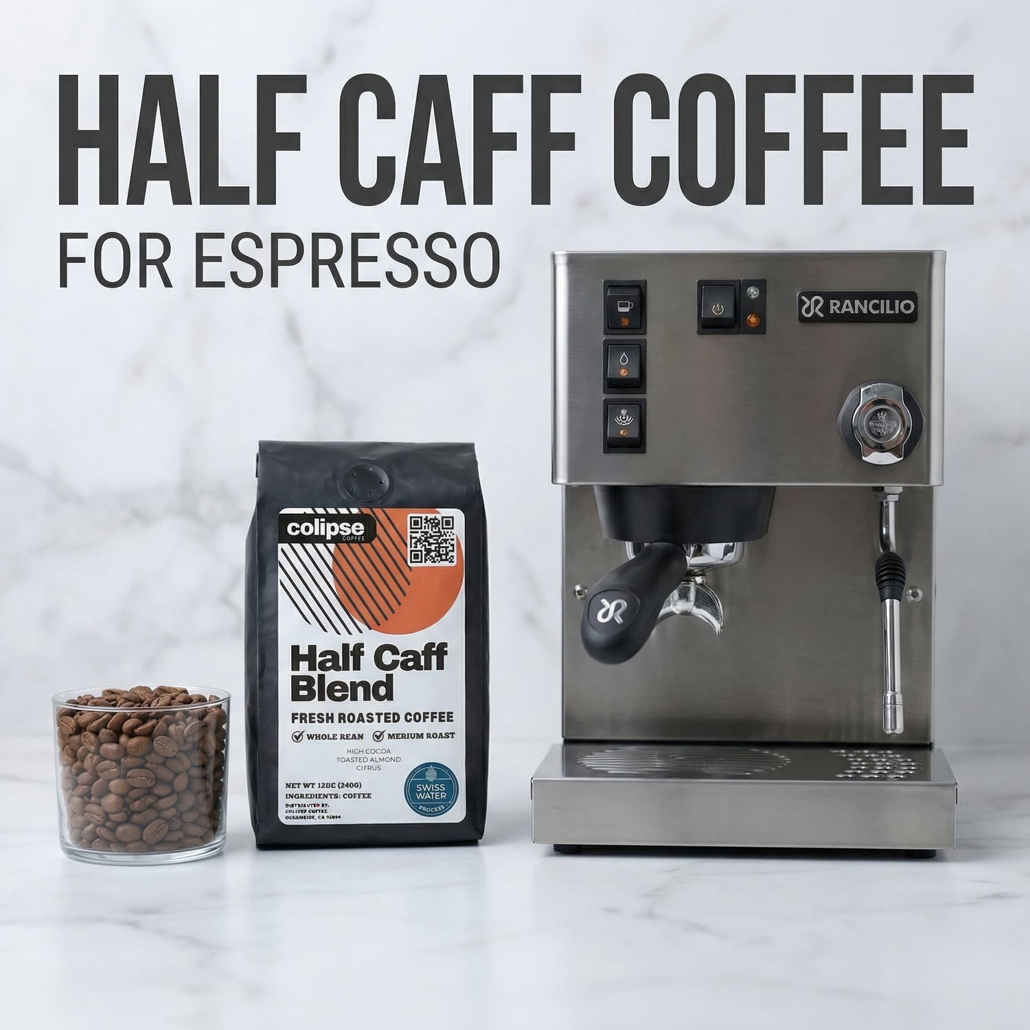Espresso machine with a bag of half-caff coffee and coffee beans on a marble surface.