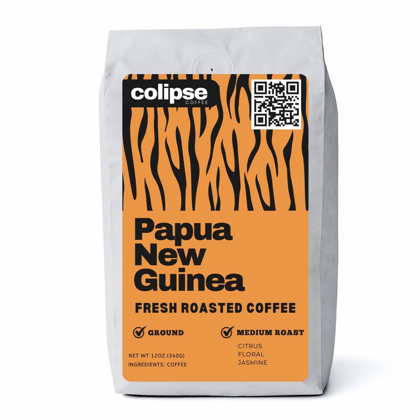 A bag of Colipse Papua New Guinea coffee grounds with deep, complex notes.