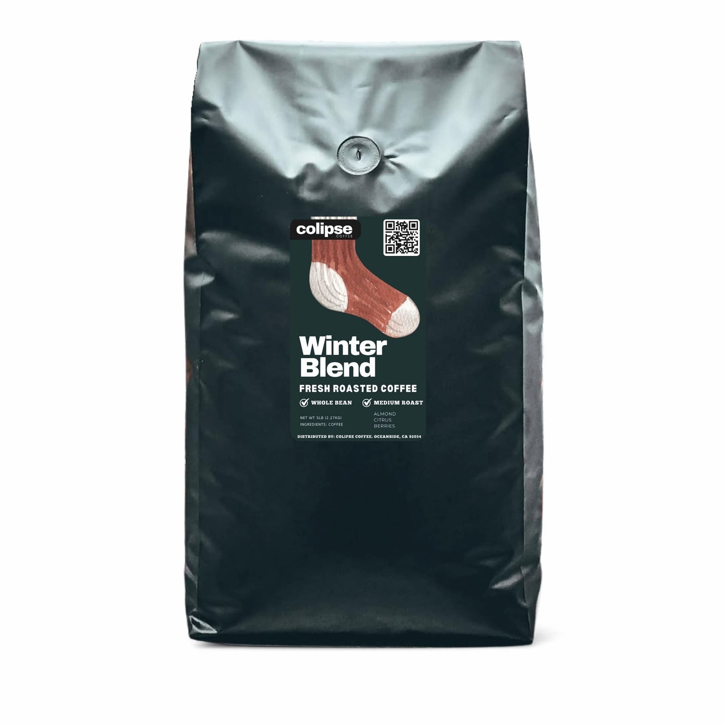 Black paper bag of colipse winter blend coffee on a white background