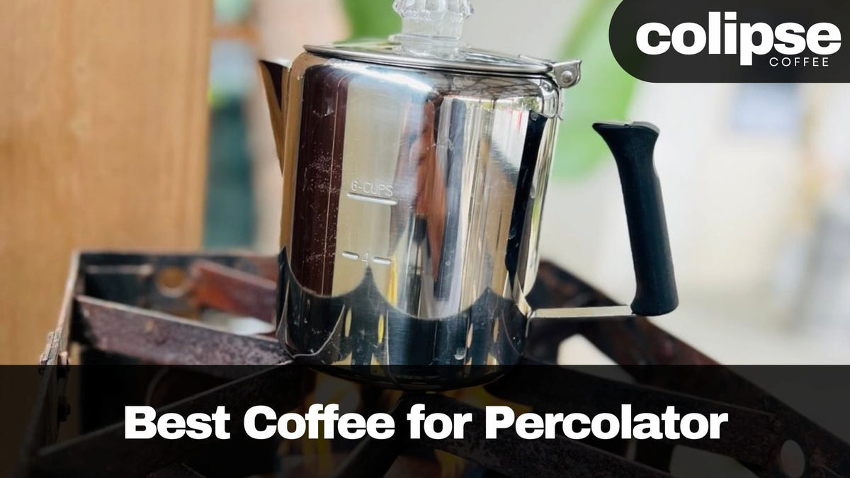 Silver percolator on a stove with 'colipse coffee' branding.