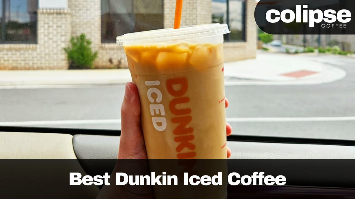 Hand holding a Dunkin' iced coffee cup with a Colipse Coffee logo in the background.