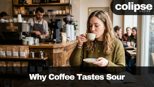 Woman drinking coffee in a cafe with 'colipsce Coffee' branding.