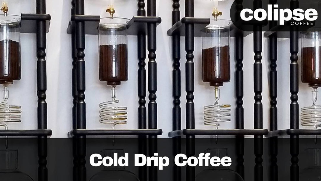Cold drip coffee towers with spiral glass coils slowly brewing coffee
