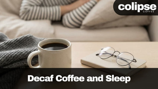 Cup of coffee, glasses, and notebook on a table with 'colipse Coffee' branding.