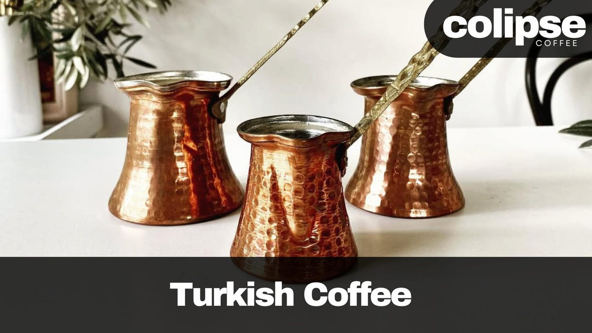 Three copper Turkish coffee pots on a white surface with 'colipse coffee' branding.
