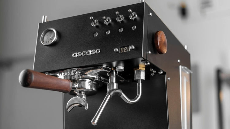 Espresso machine with wooden handle on a wooden surface