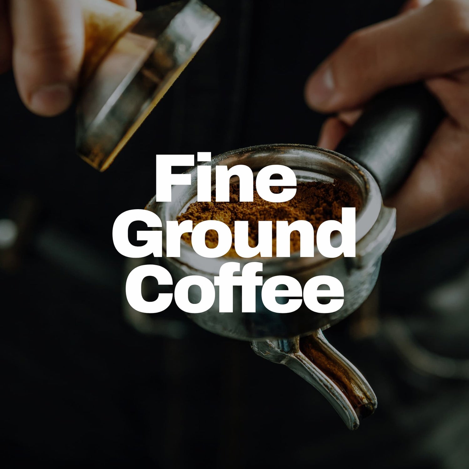Espresso portafilter filled with fine ground coffee.