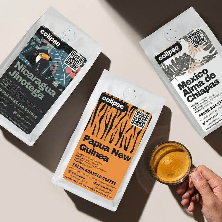 Close-up of Single Origin Coffee cherries clustered on a branch. 