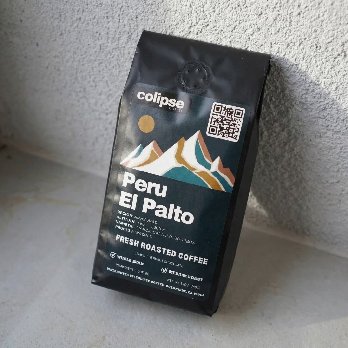 Colipse Coffee Peru El Palto packaging on a textured surface