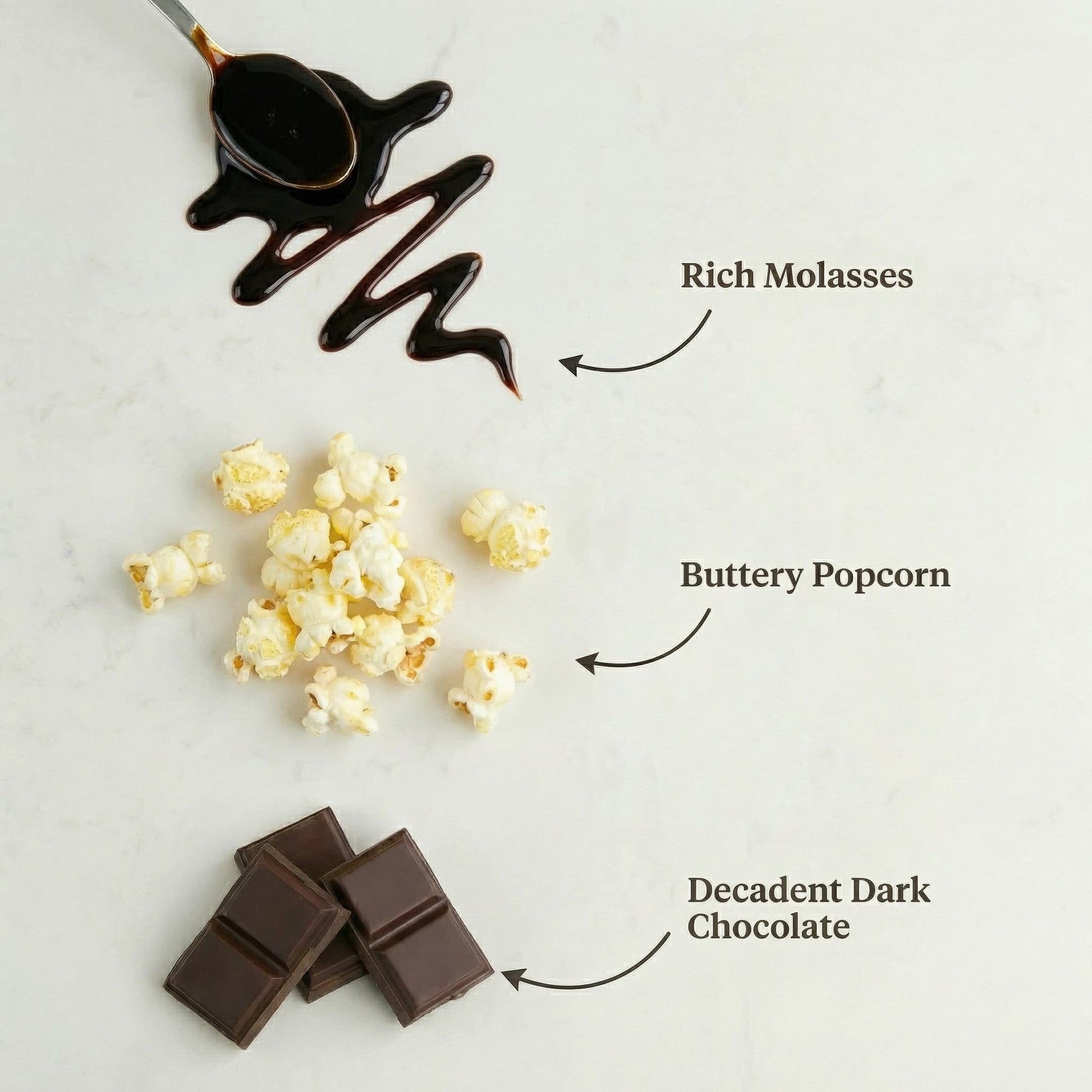 Buttery popcorn with dark chocolate and molasses on a light background
