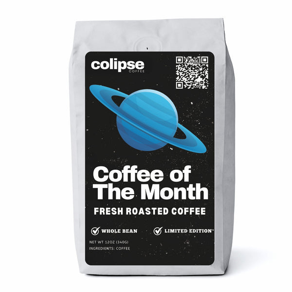 A bag of Colipse coffee labeled 'Coffee of The Month' with a graphic of a planet and the text 'Fresh Roasted Coffee' and 'Limited Edition'.
