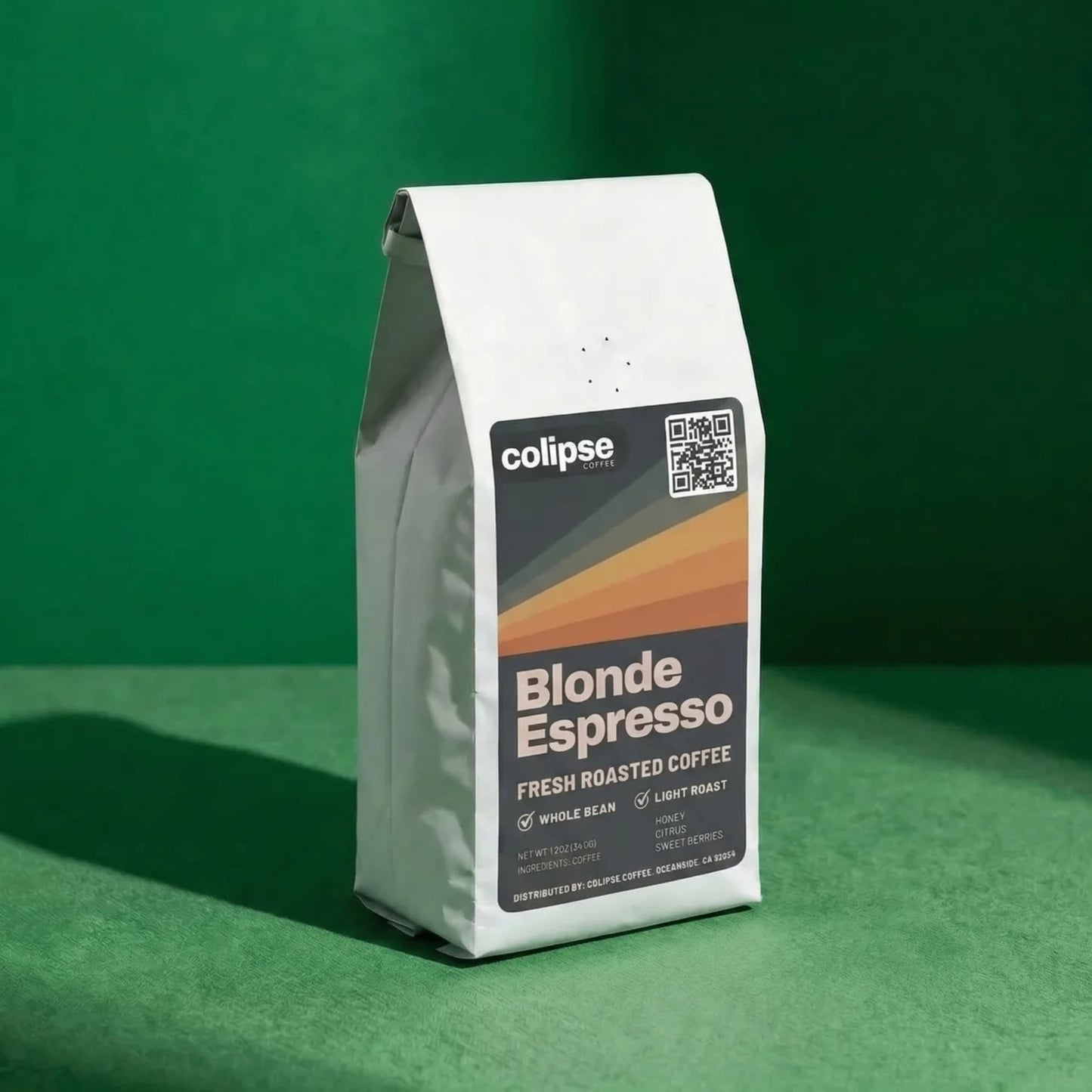 Colipse Blonde Espresso coffee package on a green background