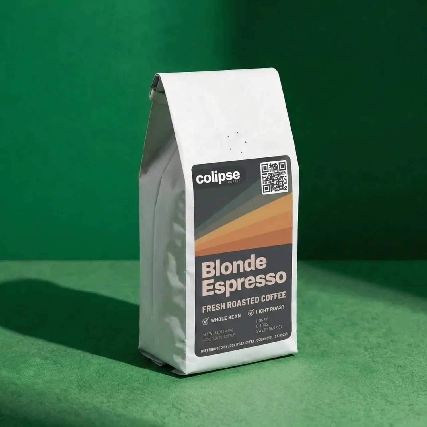 Colipse Blonde Espresso coffee package on a green background