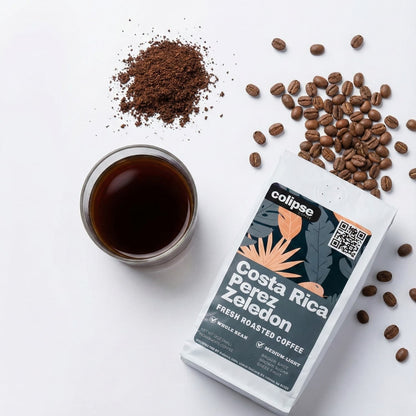 Colipse Costa Rica Perez Zeledon coffee packaging with a cup of coffee and coffee beans on a white background