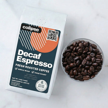 Decaf Espresso coffee package with a bowl of coffee beans on a white background