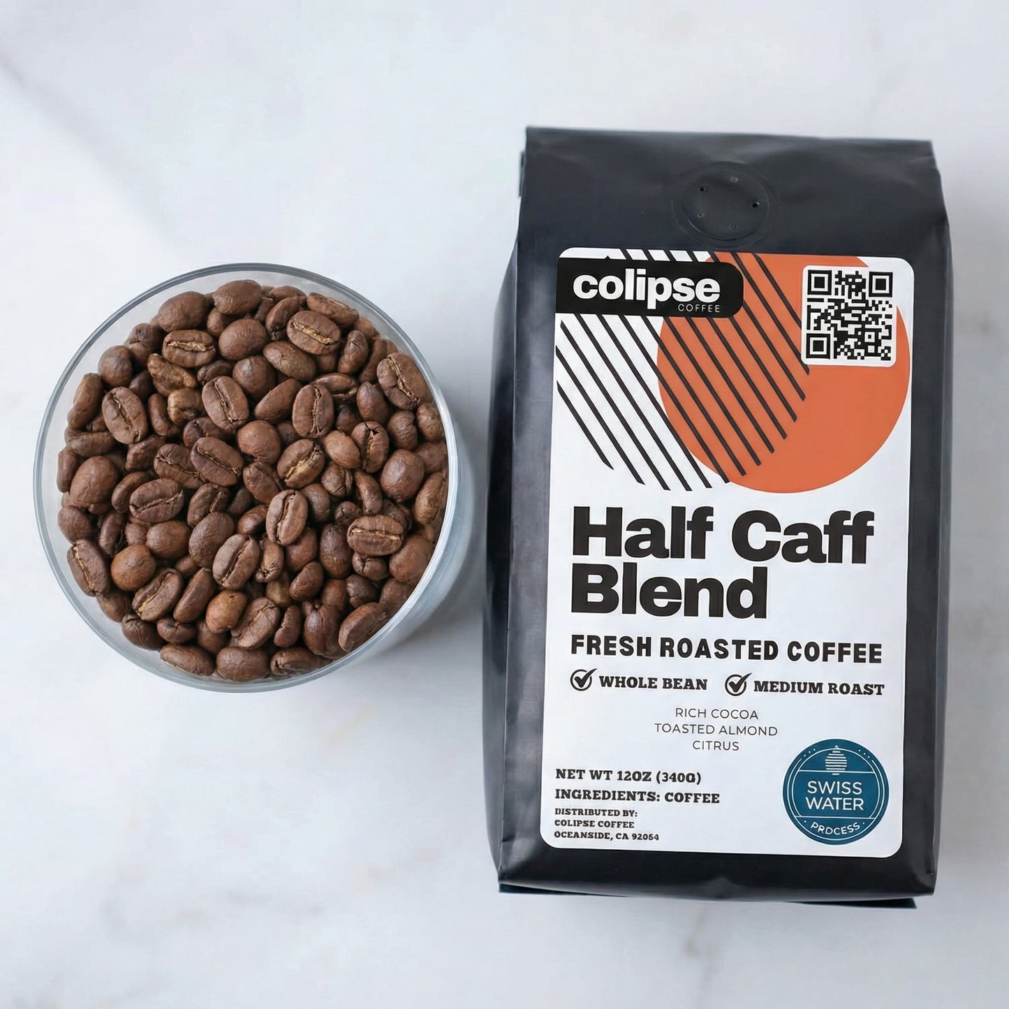 Colipse Half Caff Blend coffee package with a bowl of coffee beans on a white background