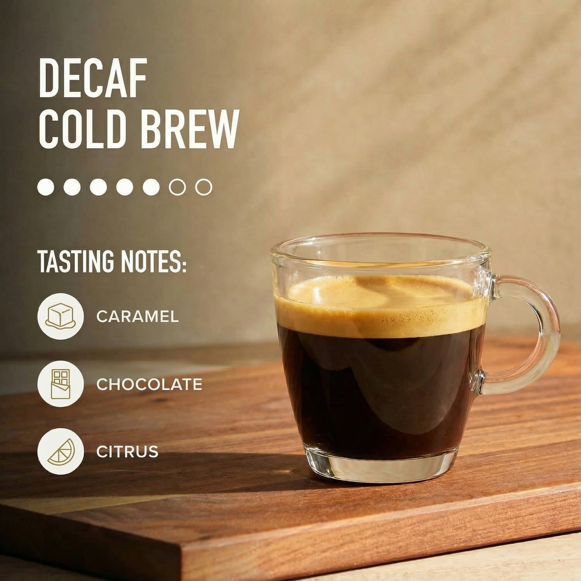 Decaf cold brew coffee in a glass mug with tasting notes on a wooden surface