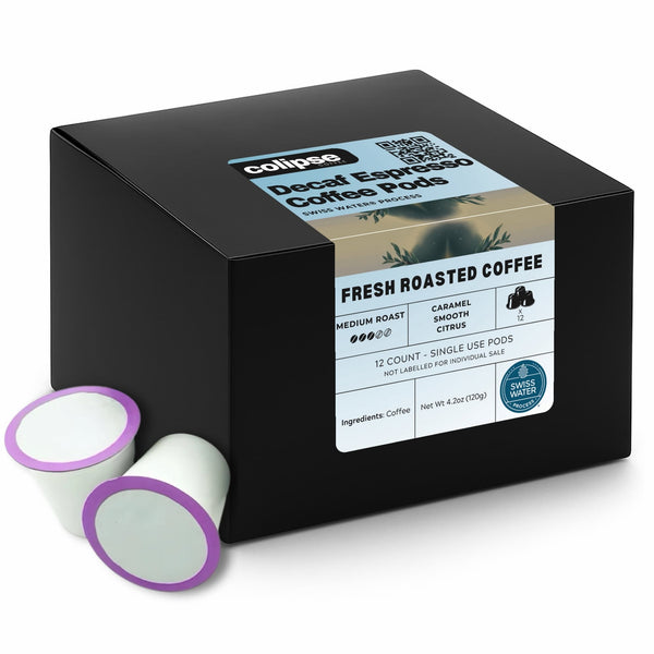 A black box of Colipse Swiss Water Decaf Coffee Pods with two single-serve capsules displayed in front. The packaging indicates the product is a fresh roasted coffee with a count of 12 and is compatible with Keurig Brewers.