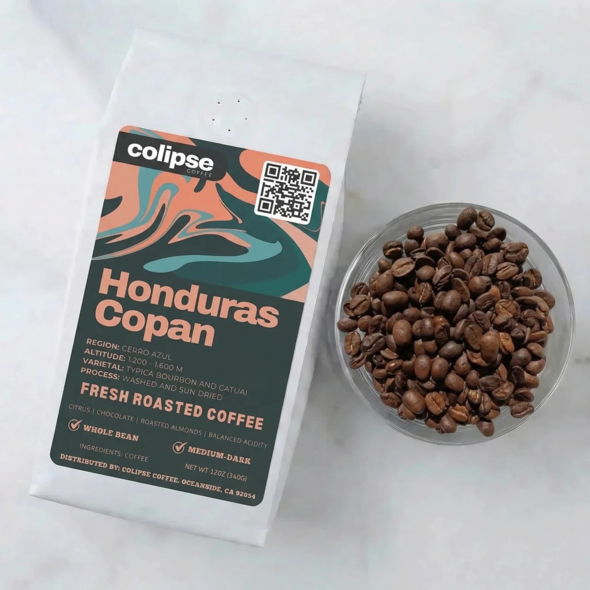 Colipse Honduras Copan coffee package with a bowl of coffee beans on a white background