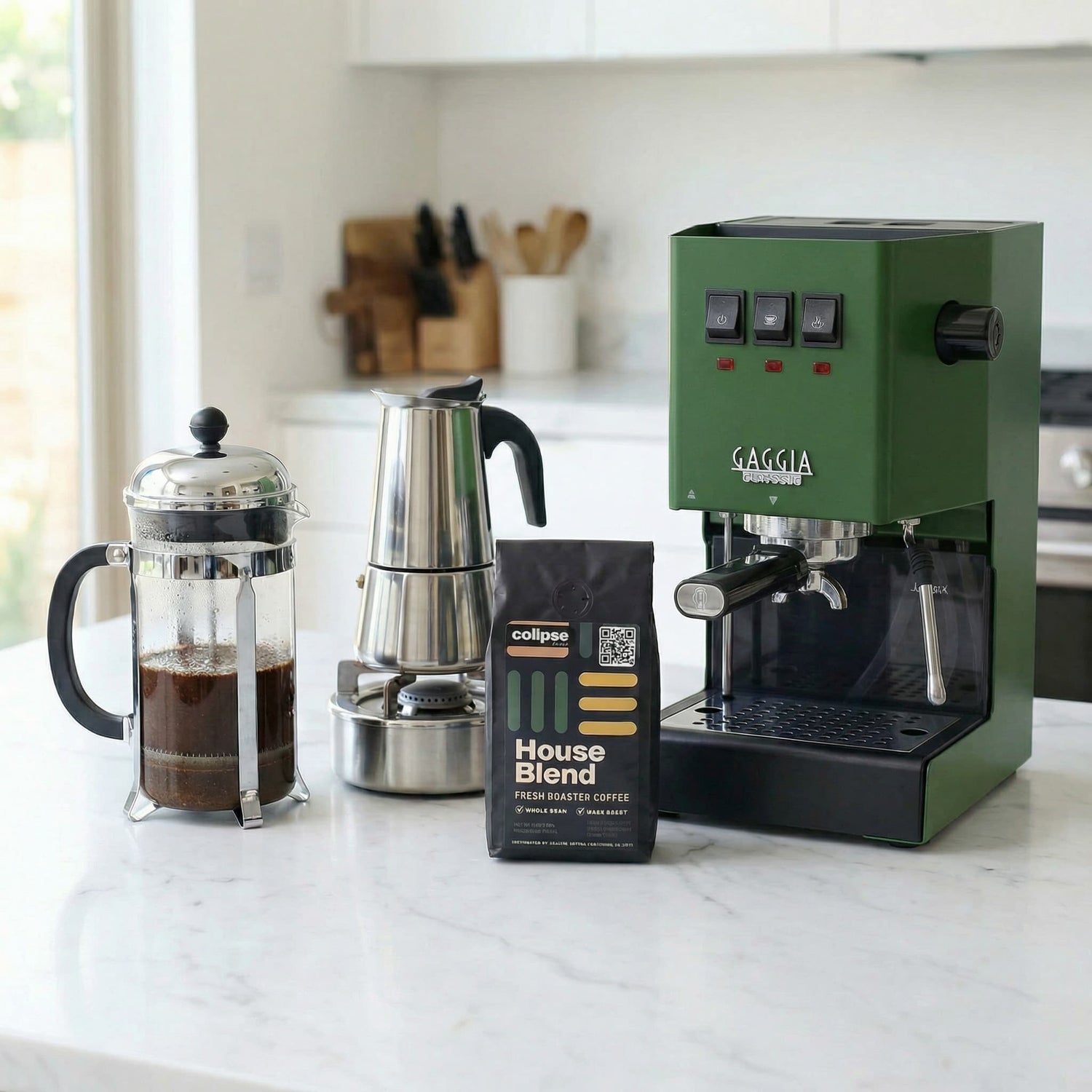 Green Gaggia espresso machine on a kitchen counter with a French press, Moka pot, and Colipse House Blend coffee bag.