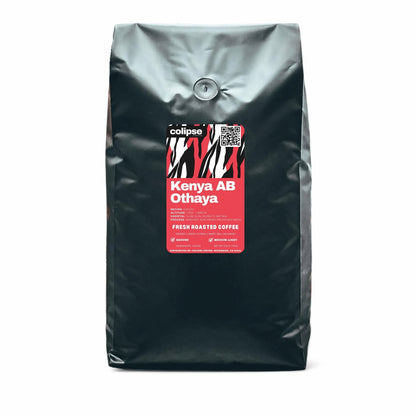 Black coffee bag with a red label featuring 'Kenya AB Othaya' on a white background