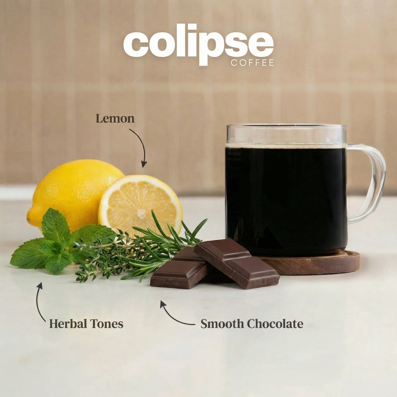 Colipse Coffee with lemon, chocolate, and herbs on a neutral background