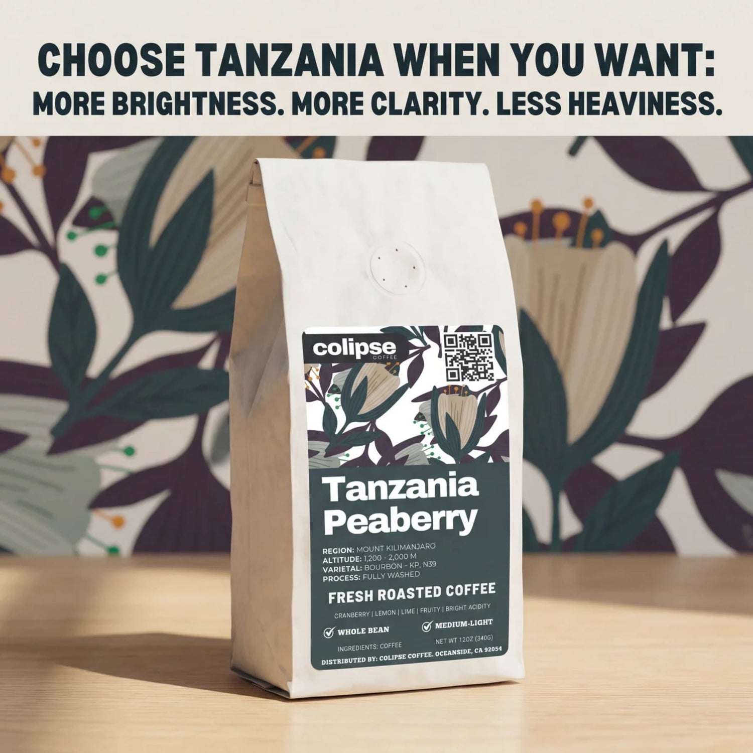 Coffee bag labeled 'Tanzania Peaberry' with floral background